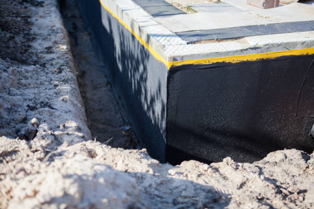 Professional Waterproofing technician working in Jefferson, WI